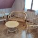 Rattan lounge with removable cushions