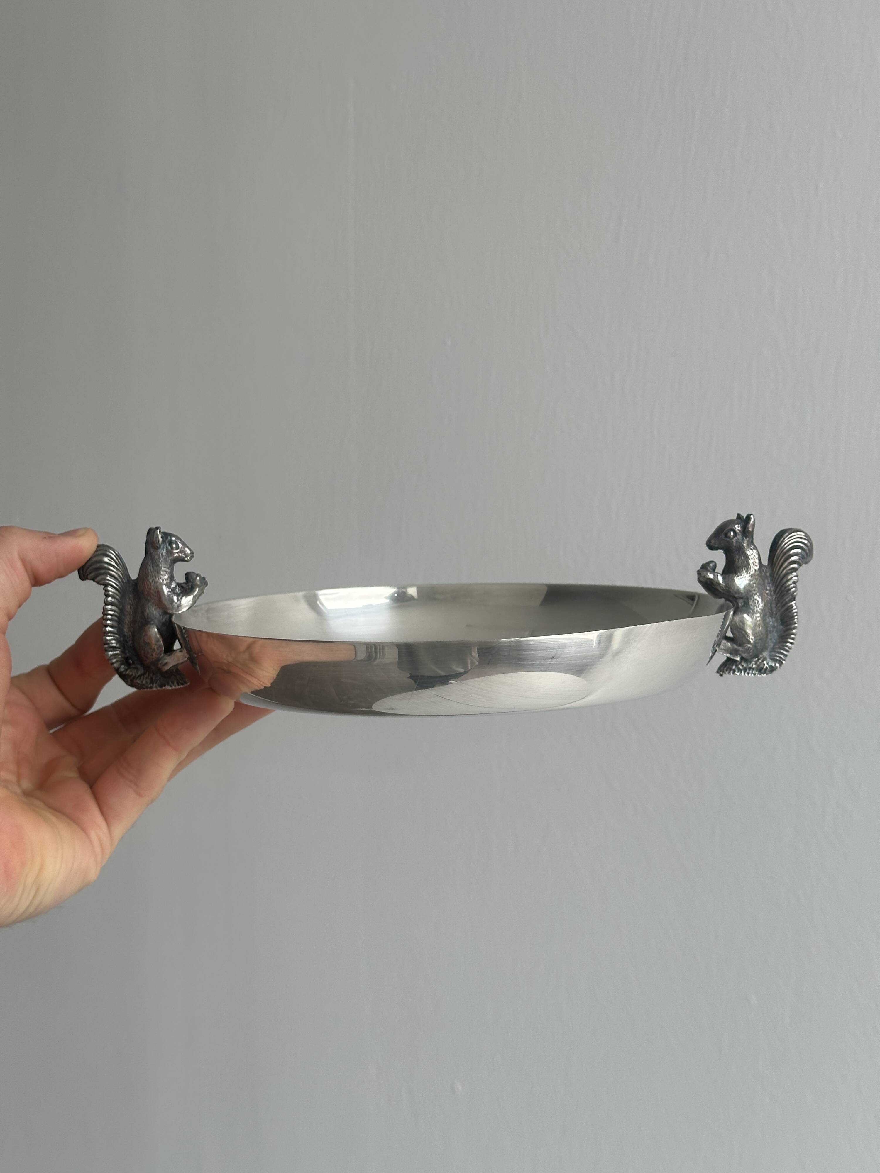 Small shiny silver metal dish