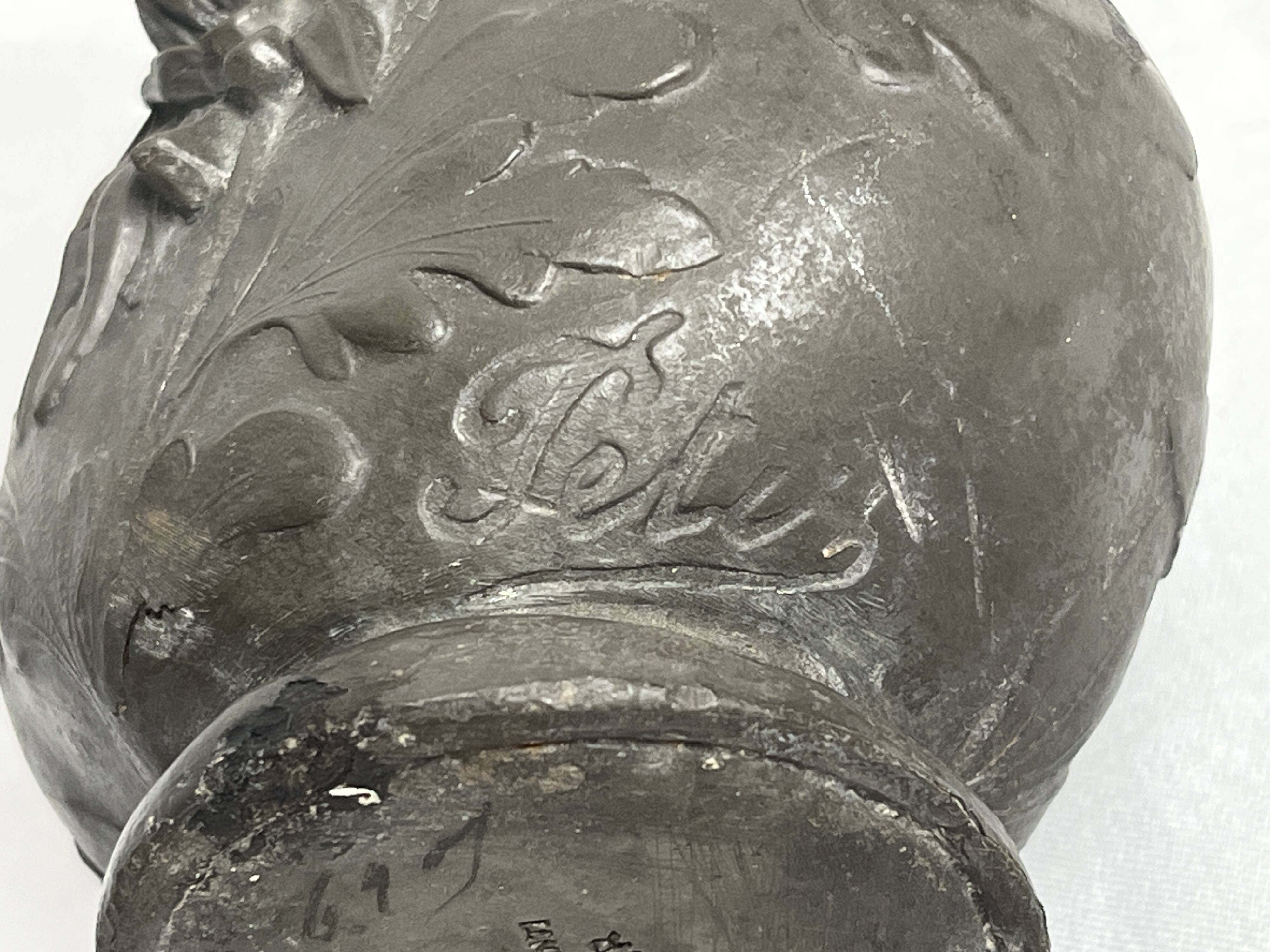 Art Nouveau, a single flower vase jug in pewter signed Petiz around 1900.