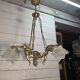 Bronze cherub chandelier from the 1970s.