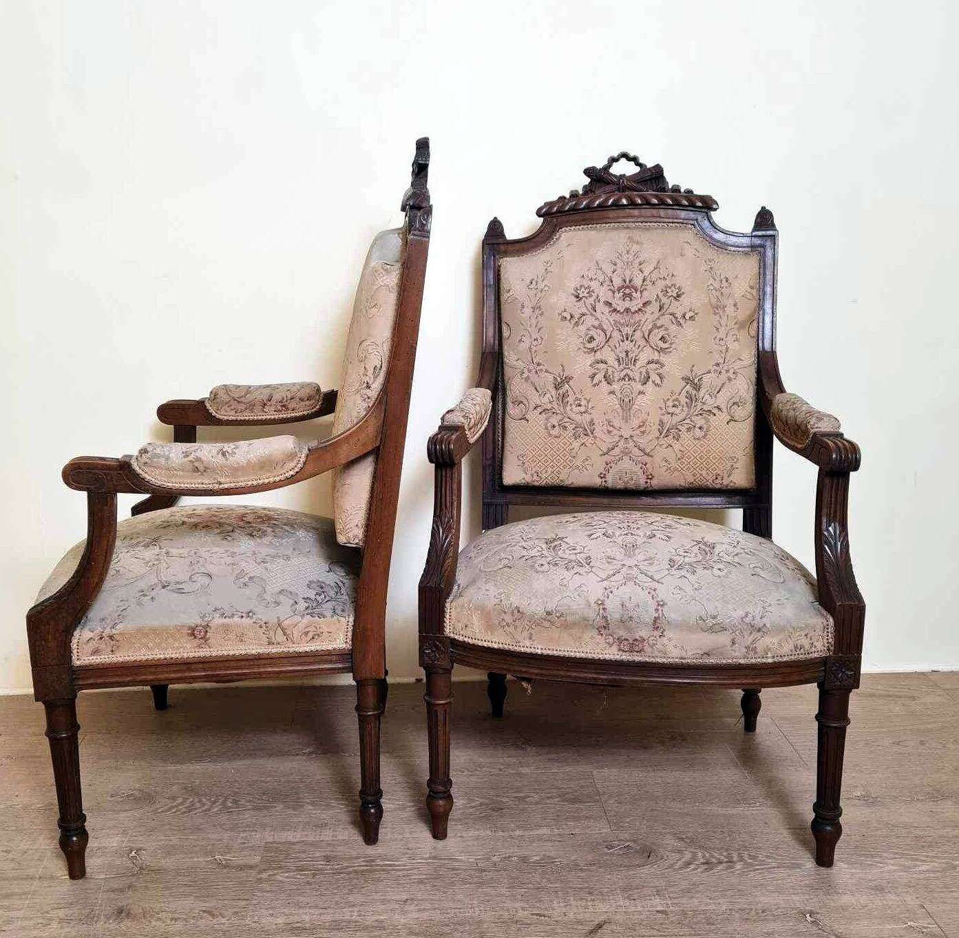 Pair of Louis XVI style queen-style armchairs in richly carved wood