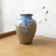 Enamelled sandstone vase