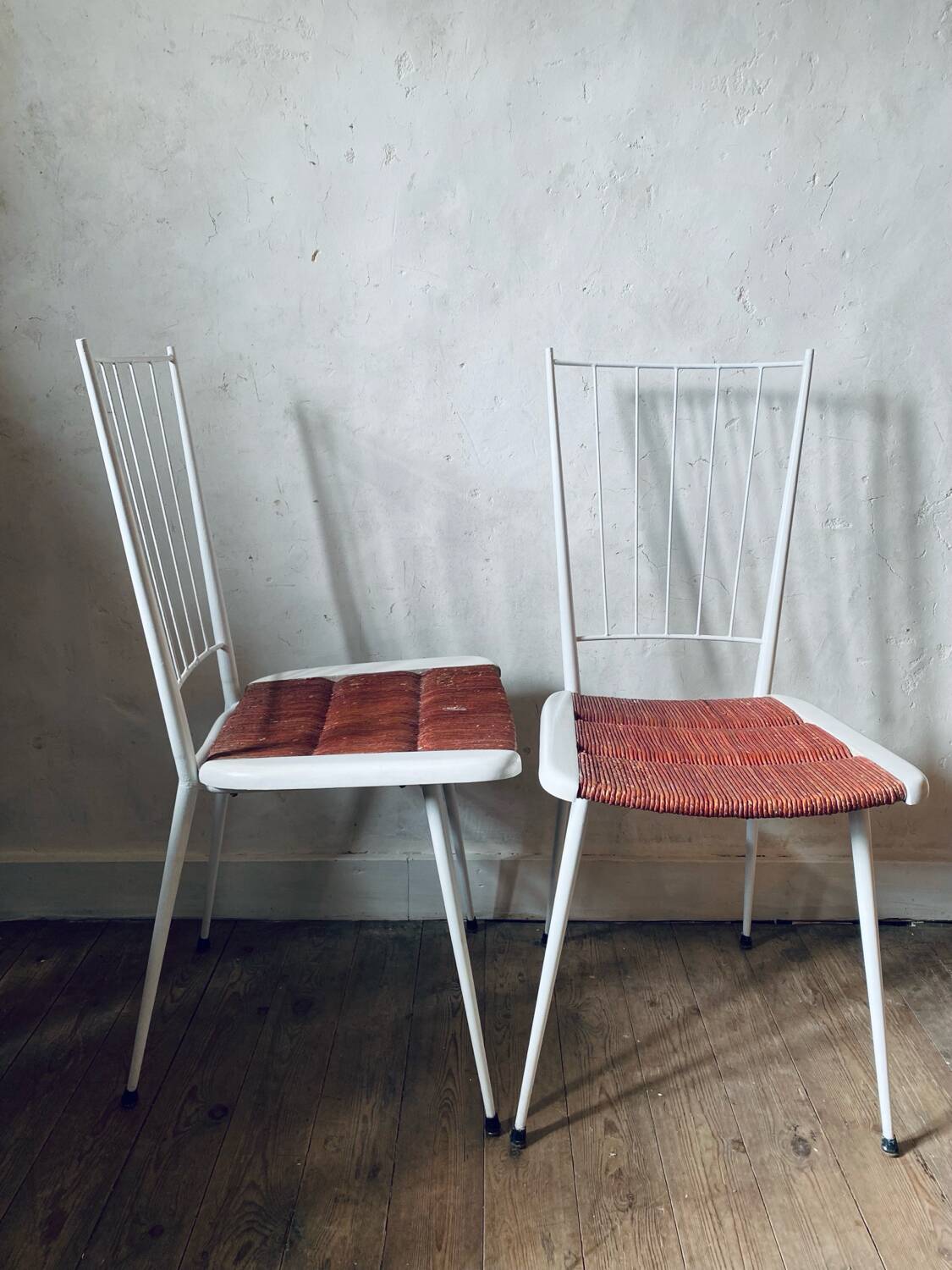 Metal and straw chairs