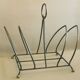 Art deco metal design magazine holder