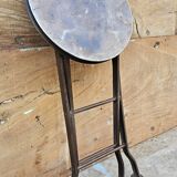 Old industrial folding steel stool
