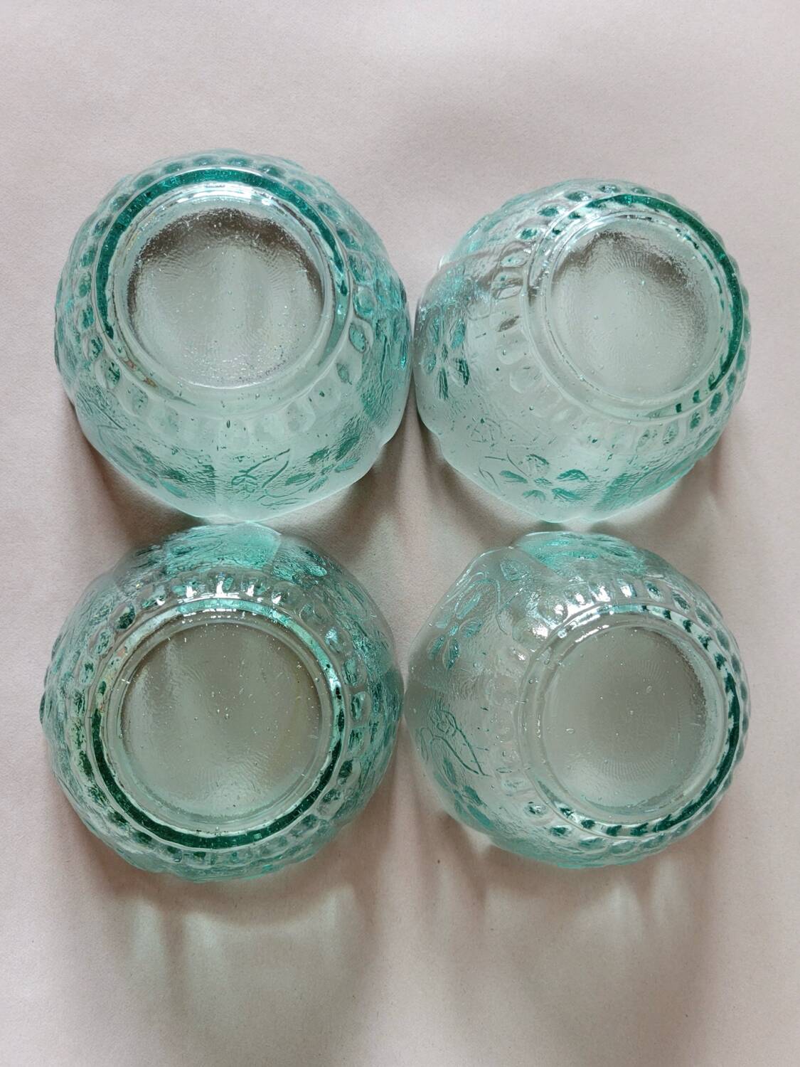 4 ramekins with embossed designs