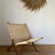 Fauteuil pliant en bois et rotin