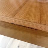 Extendable table designed by Alain Richard