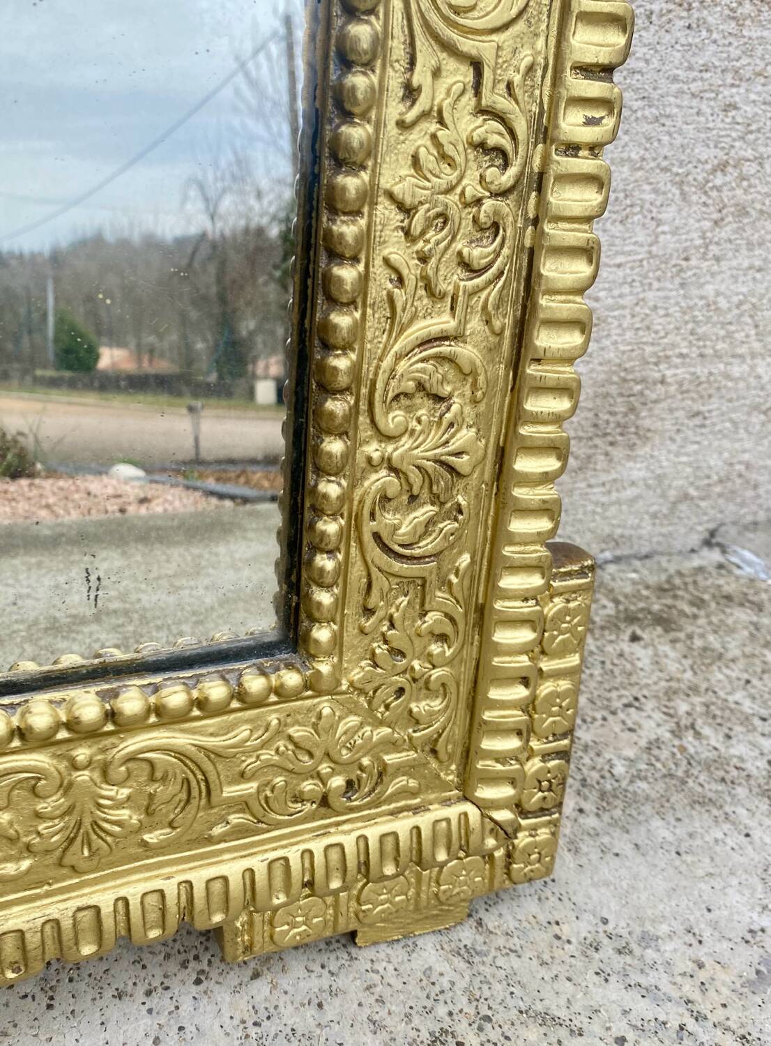 Two antique 19th century mirrors in carved Napoleon oak wood