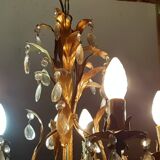 Very pretty chandelier with tassels and leaves in gold sheet metal.