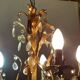 Very pretty chandelier with tassels and leaves in gold sheet metal.