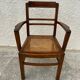 Cane armchair with armrests