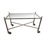 Rolling coffee table in vintage gilded bronze