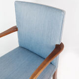 Armchair in mahogany and upholstered with light blue fabric by Fritz Hansen