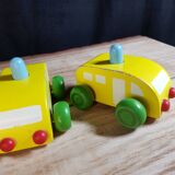4 small wooden cars