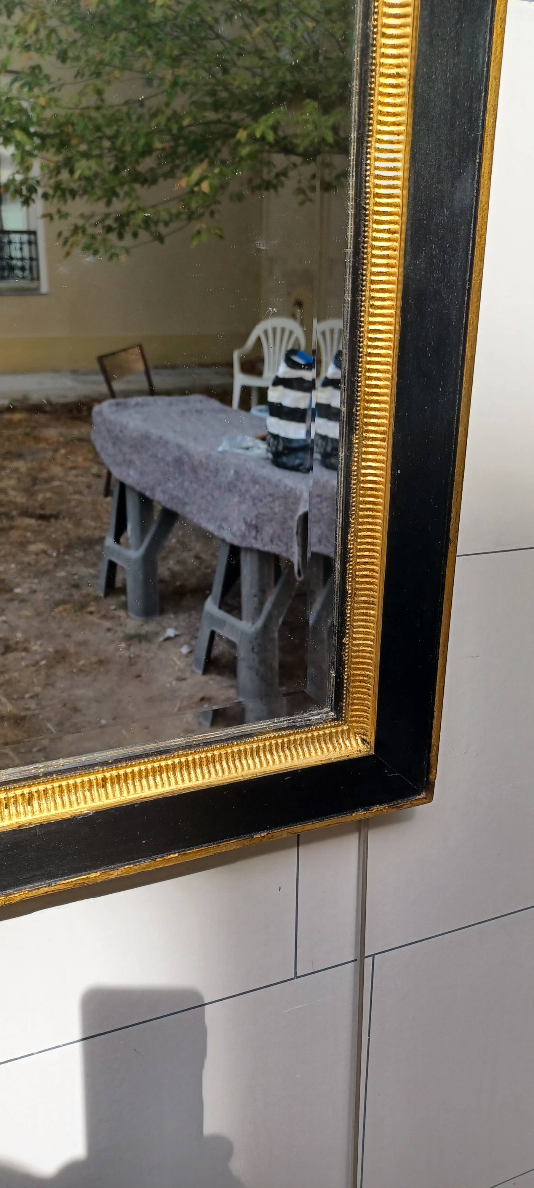 Black and gold art deco style mirror