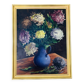 Still life painting of a bouquet of flowers, golden frame