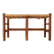 Old wooden and straw bench