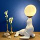 Vintage seal lamp in white ceramic and opaline.