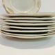 9 plates in white and gold porcelain