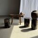 Black petrified wood side table with beige stripes, star pattern H35 D24.