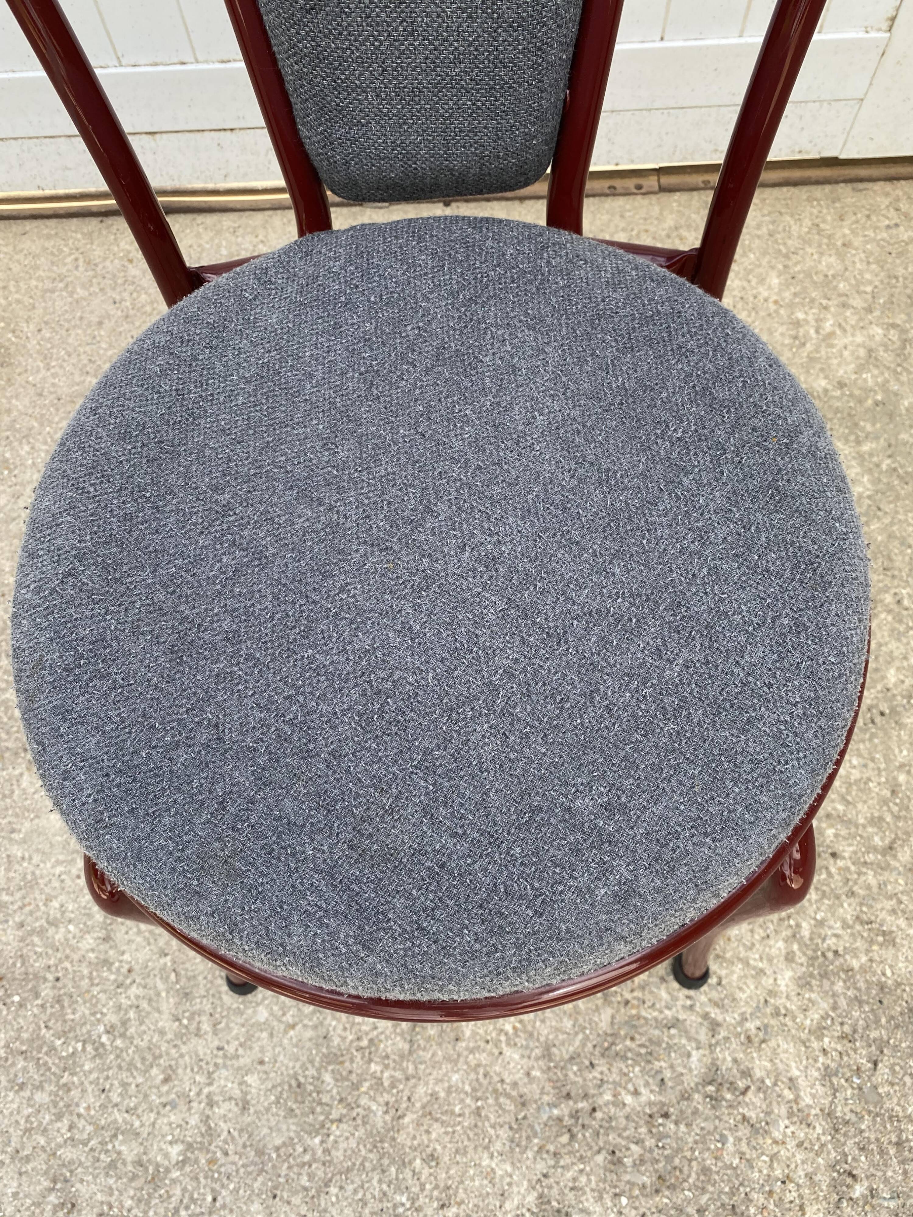 Metallic burgundy bistro chair for restaurants and communities with gray fabric