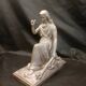 Statuette of a woman in gilded cast iron (Joan of Arc?)