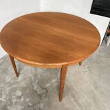 Scandinavian round teak table with extension