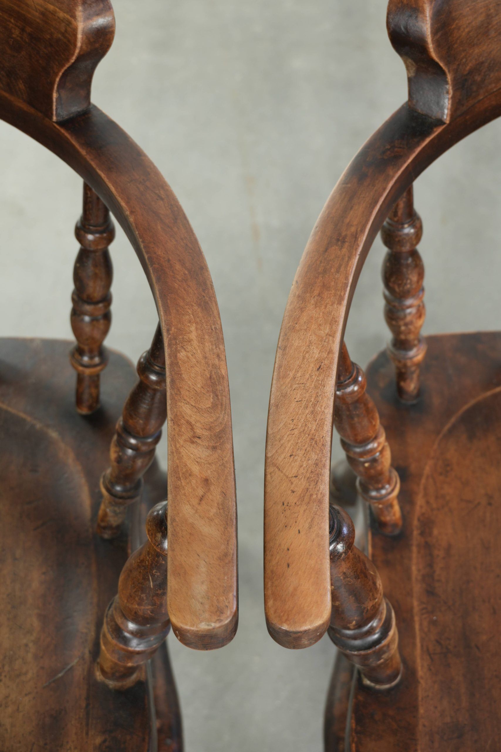 Set of four wooden English antique pub/captain chairs from the 19th century