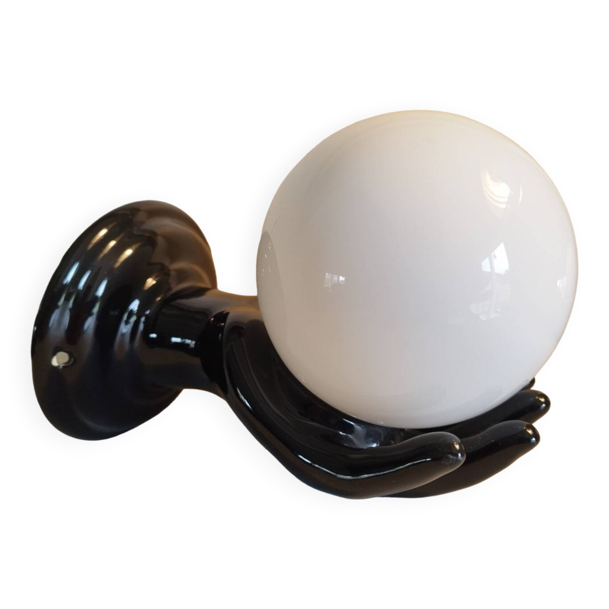 Hand-shaped wall light