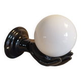 Hand-shaped wall light