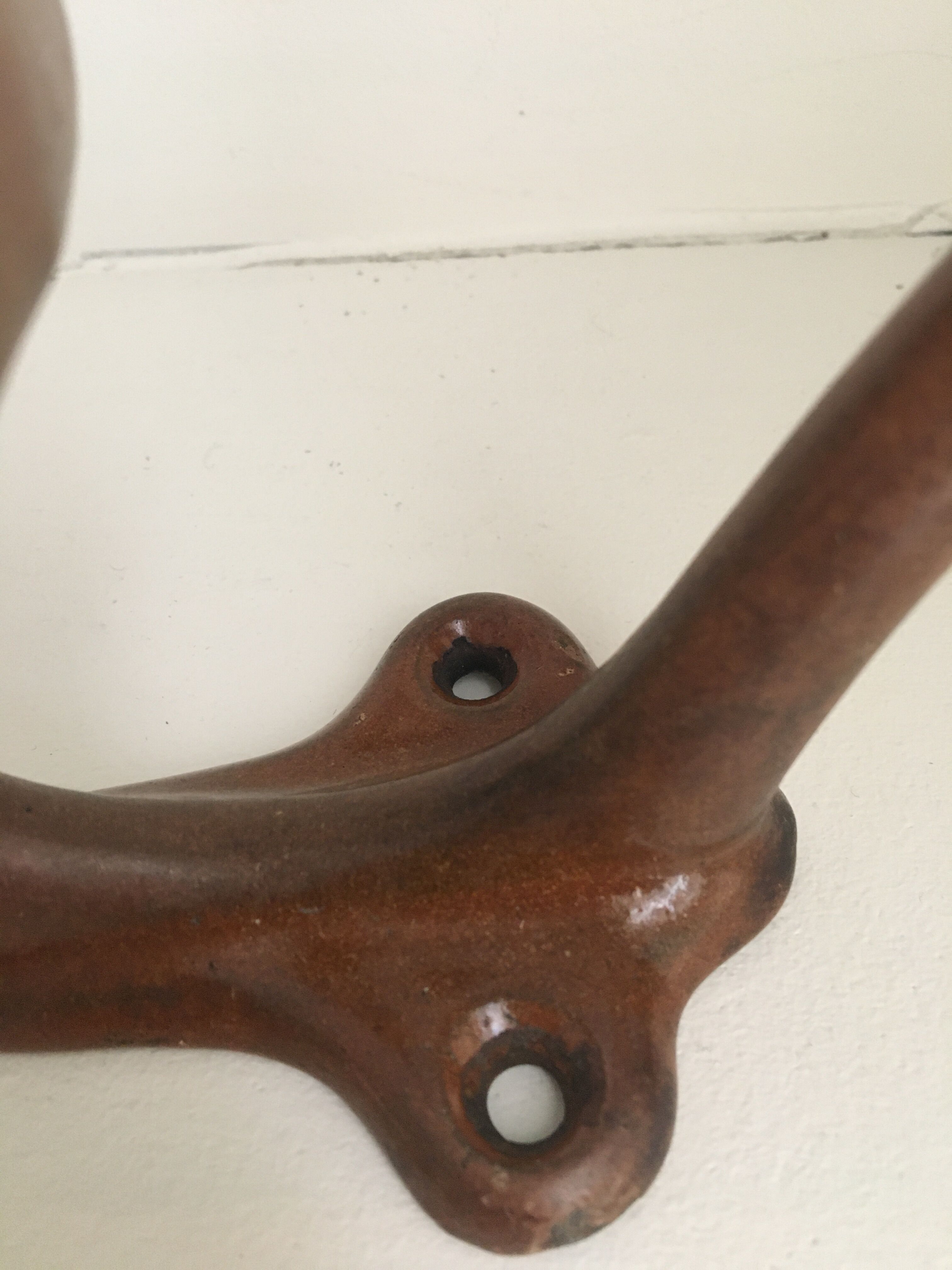 Enamelled cast iron coat rack