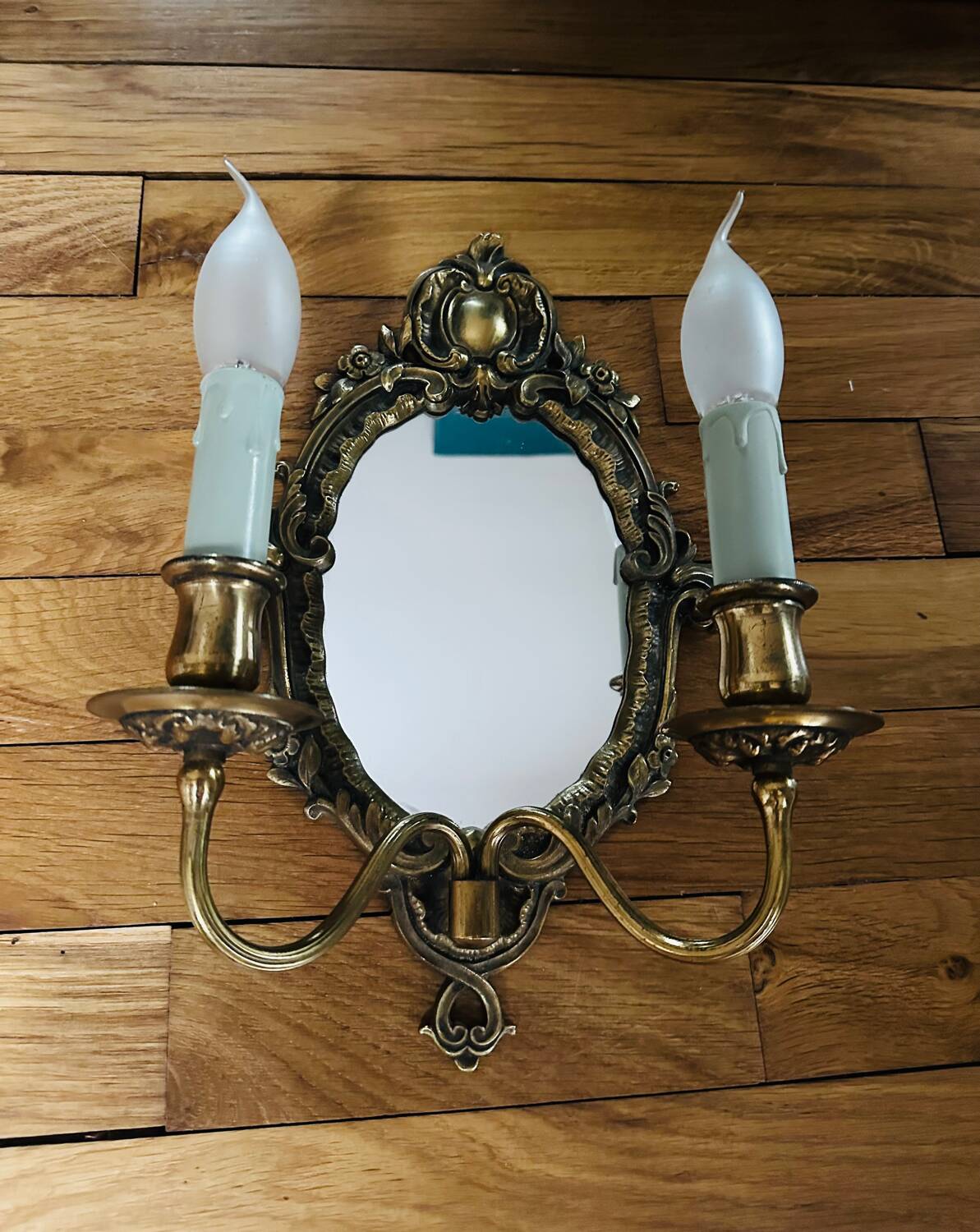 Antique bronze mirror wall sconce