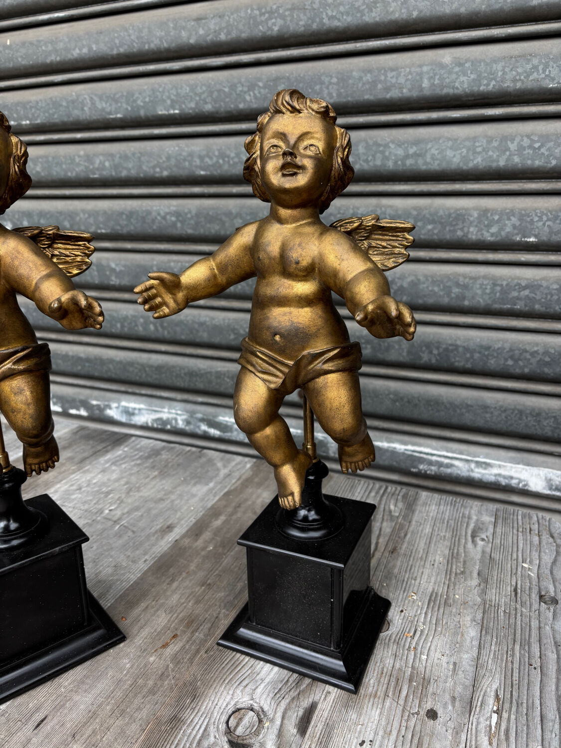 Pair of gilded cherubs on a Napoléon III base