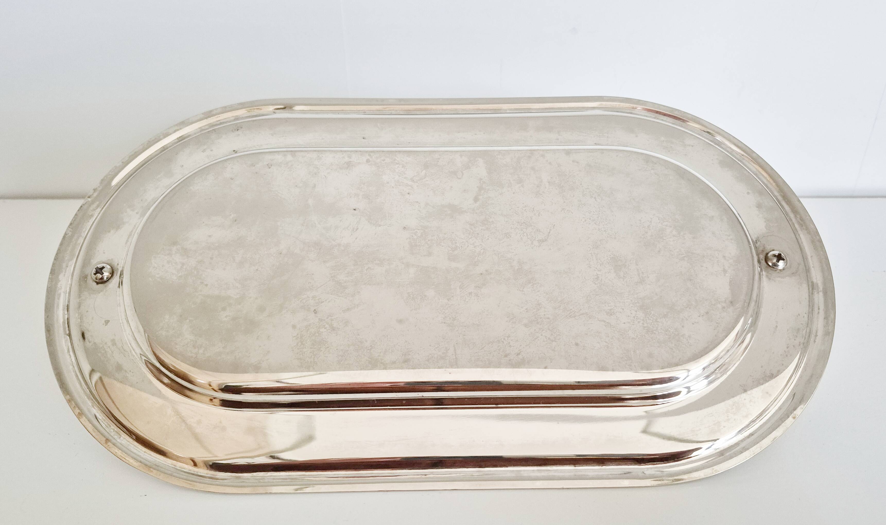 Silver-plated serving dish for foie gras.