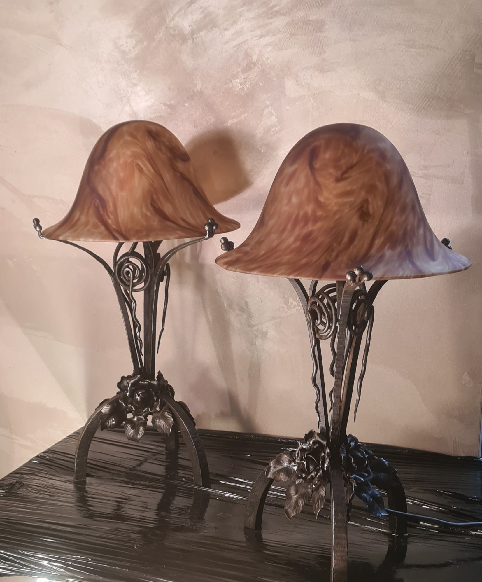 Pair of art nouveau wrought iron lamps with marbled glass paste 42x25