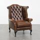Fauteuil Chesterfield en cuir de vache marron de style anglais