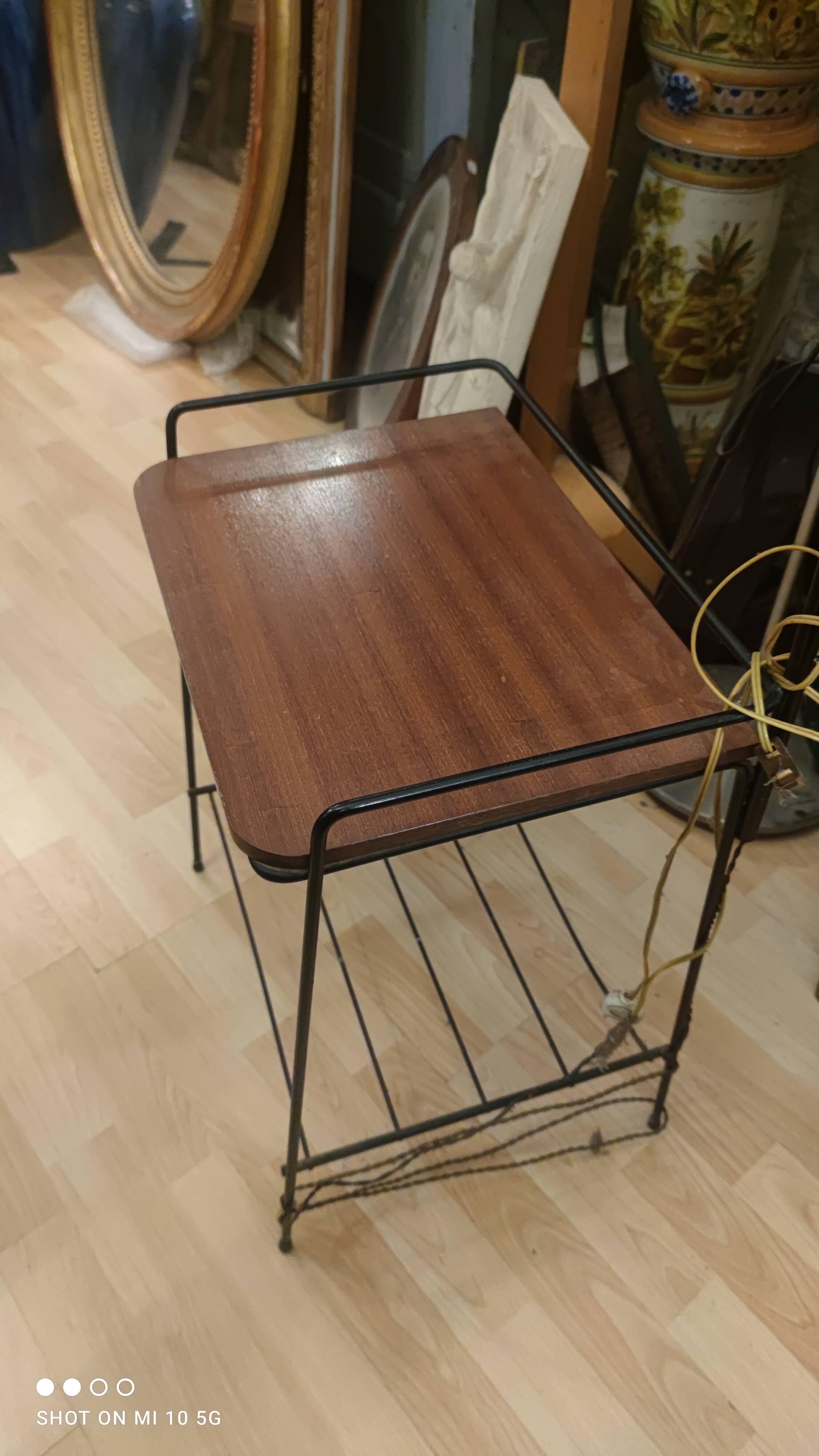 Wrought iron and mahogany floor lamp, circa 1950