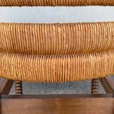 Vintage armchair in straw and brutalist wood