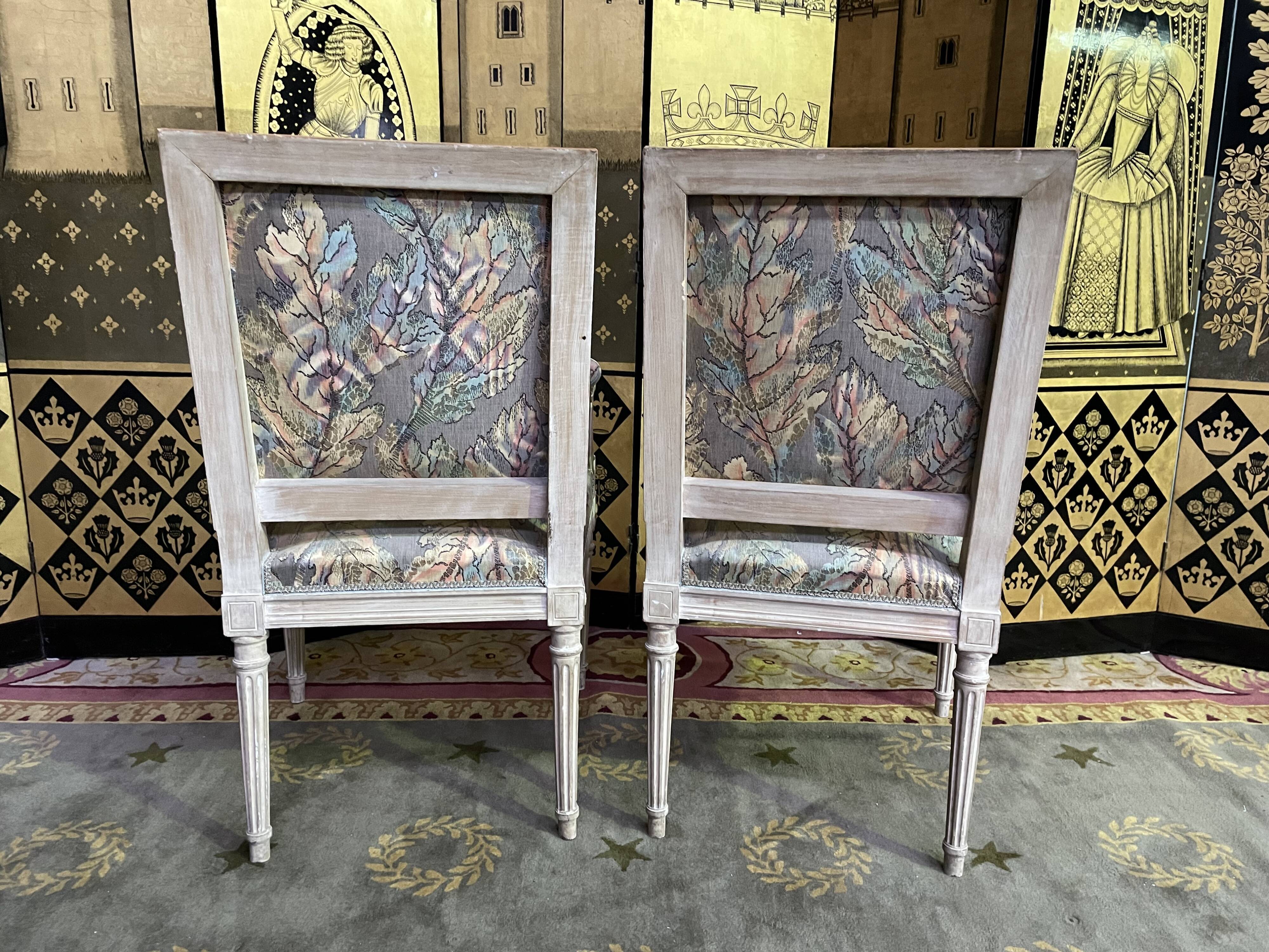 Pair of Louis XVI style convertible armchairs