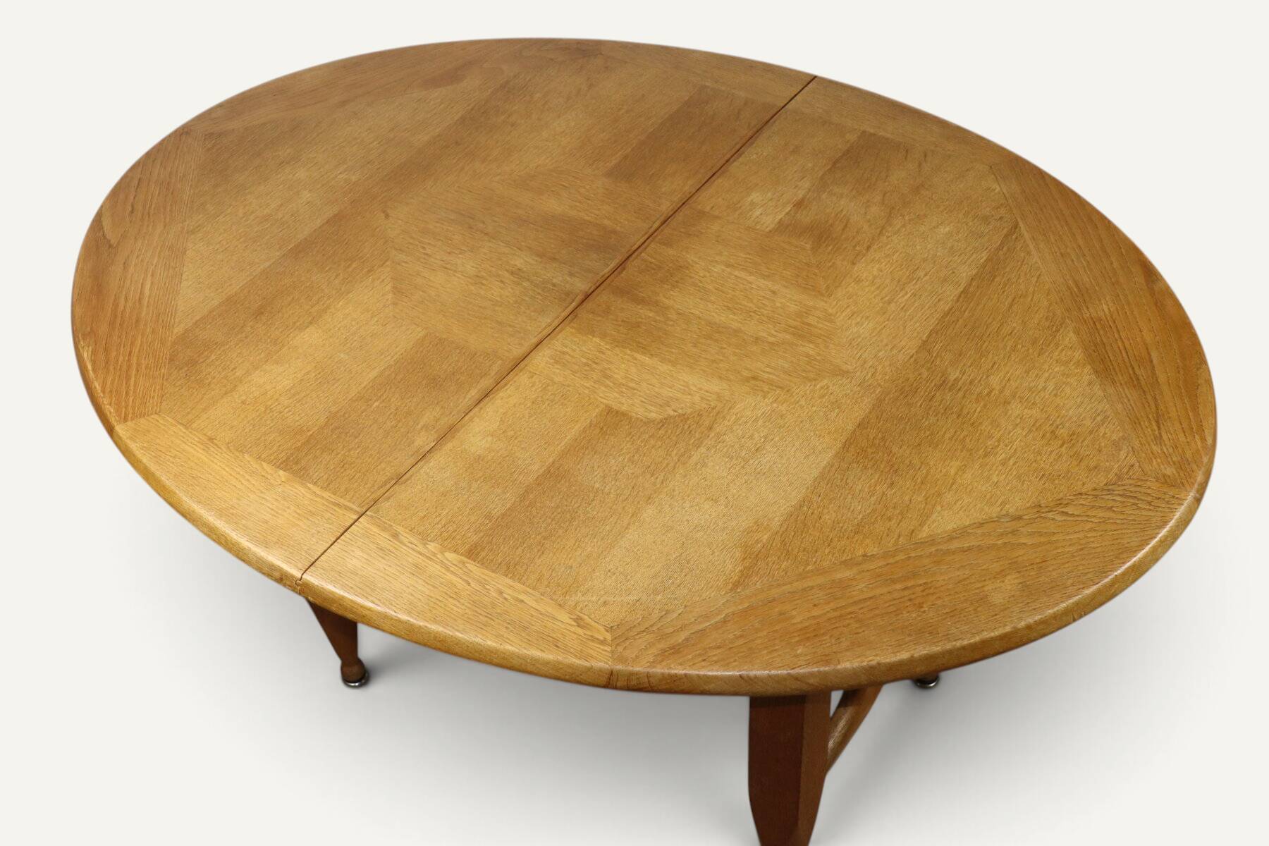 Extendable dining table in oak by Guillerme and Chambron - 1960s