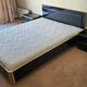 Black lacquered double bed with brass, Maison Roméo Paris, 1970s