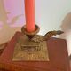 Cellar rat candle holder