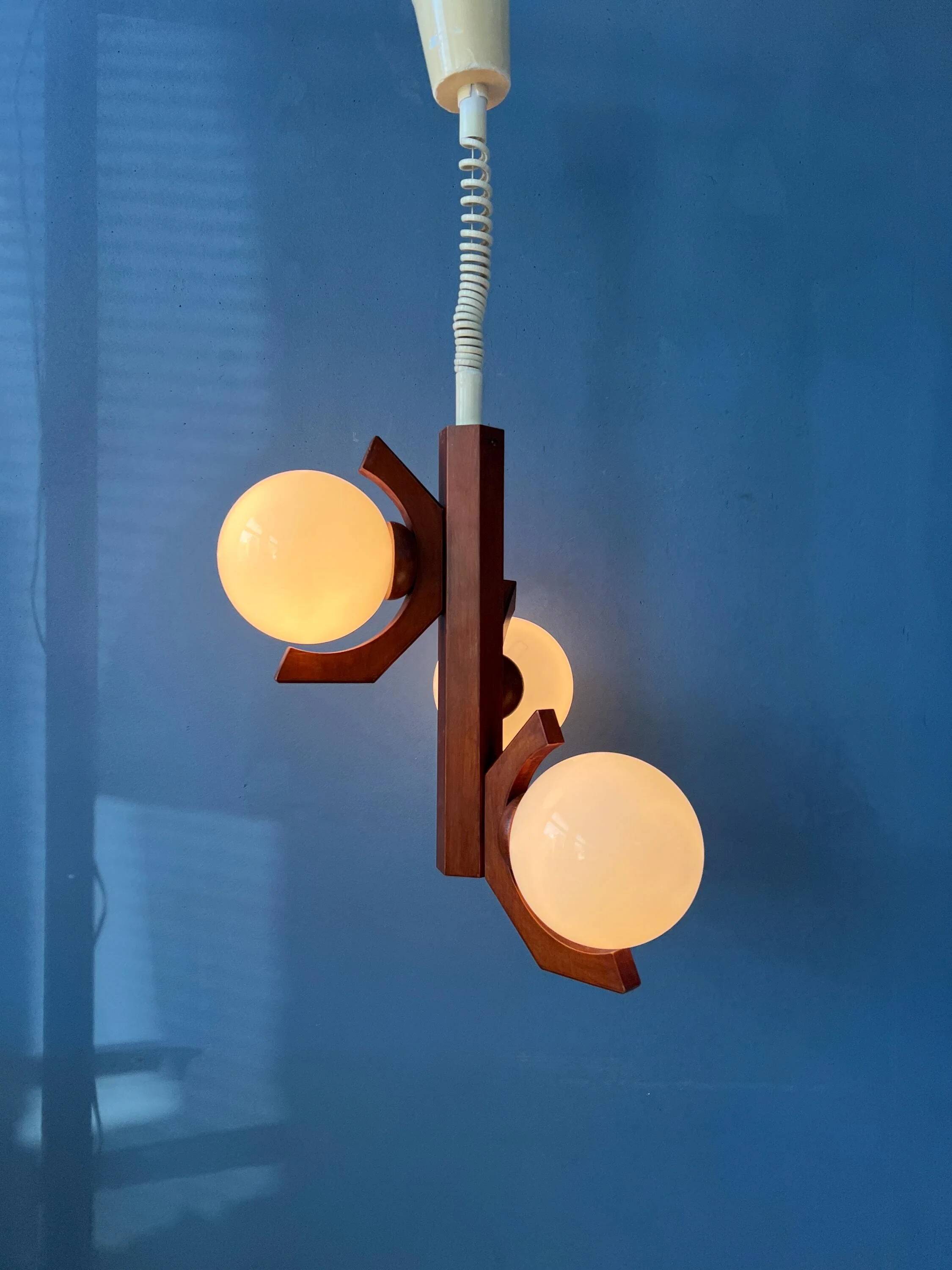 Mid-century brown Bony suspension with opaline glass shade.