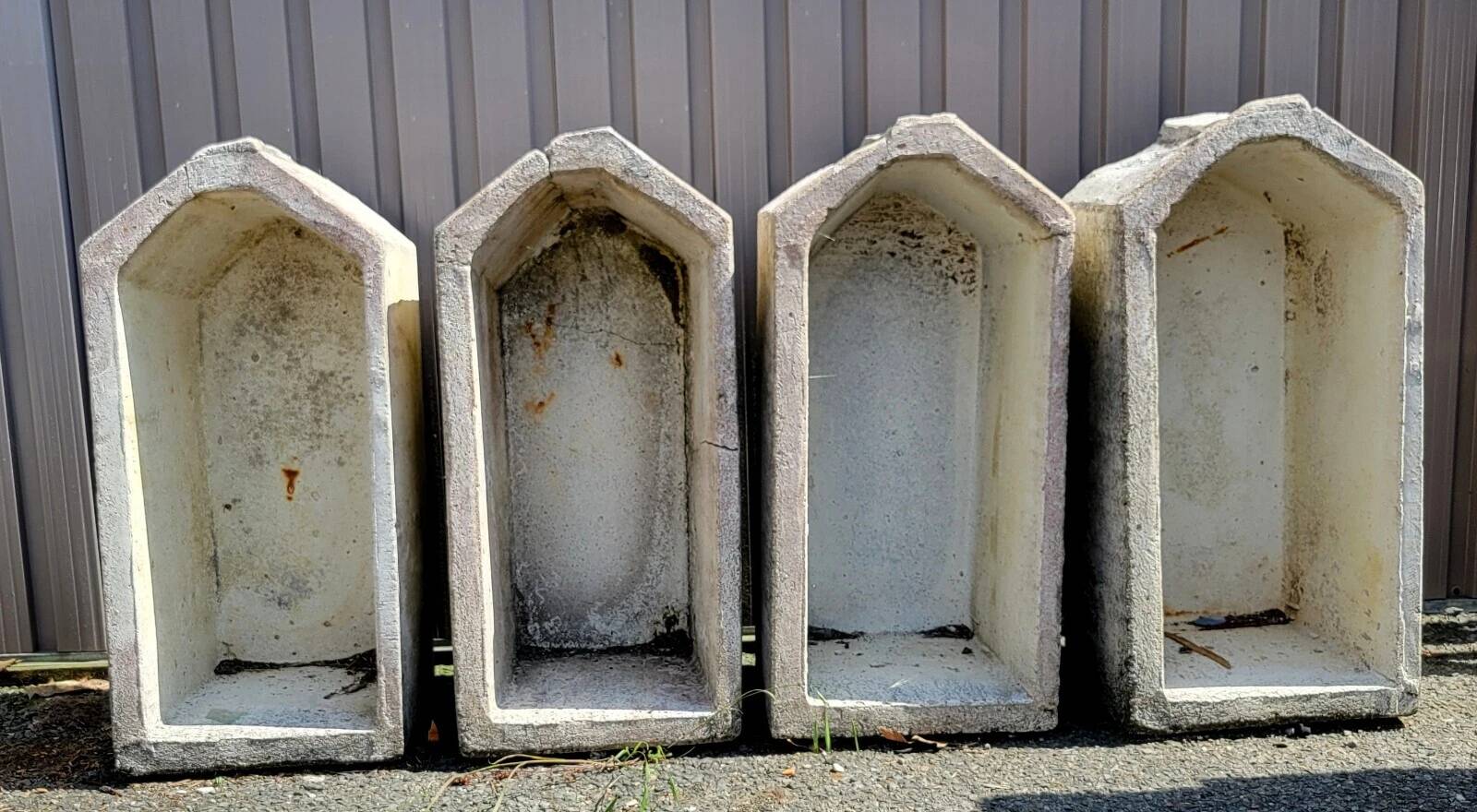 Set of 4 Art Deco style planters in reconstituted stone, 20th century