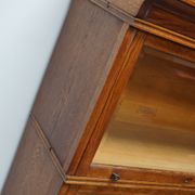 German oak bookcase with folding doors, ca 1900
