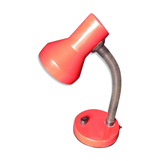 Articulated red desk lamp