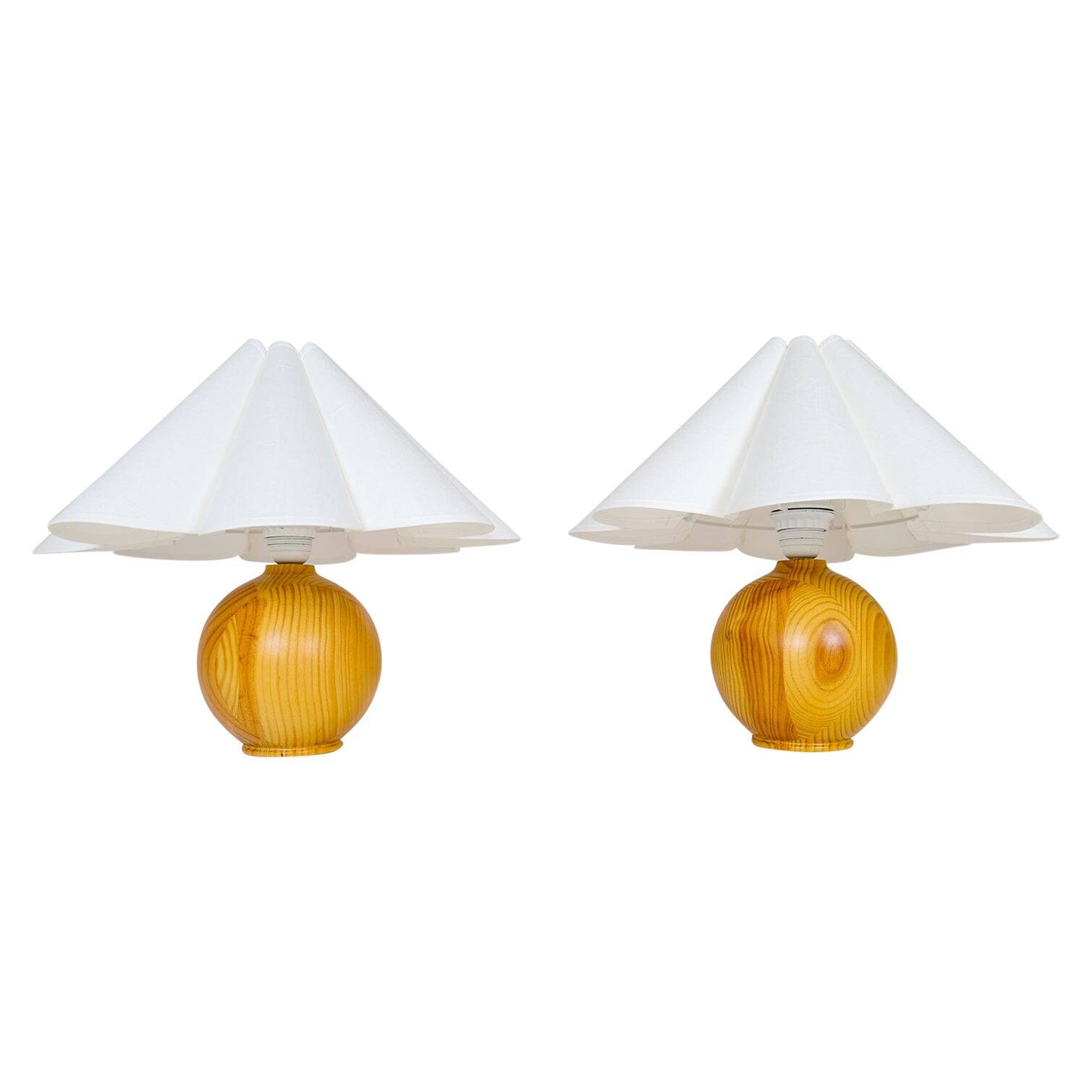 Sculptural modern table lamps from the mid-century in solid pine, Sweden, 1970s.