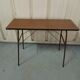 Folding table in formica brown console