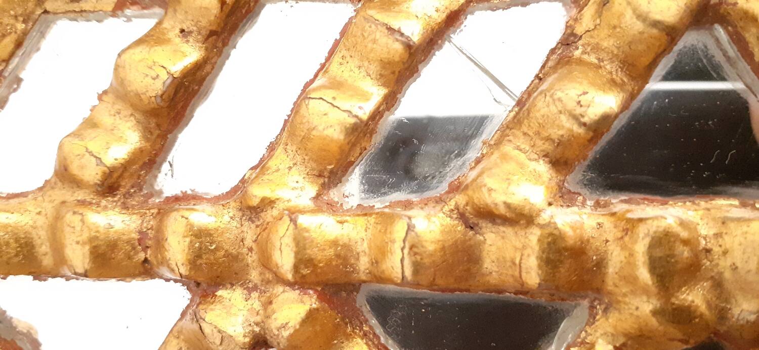 Vintage gilded mirror with glazing beads